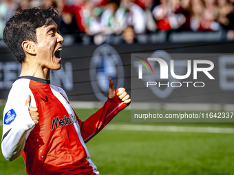 Feyenoord Rotterdam midfielder Inbeom Hwang scores the 2-0 and celebrates the goal during the match between Feyenoord and Twente at the Feye...