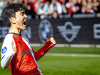 Feyenoord Rotterdam midfielder Inbeom Hwang scores the 2-0 and celebrates the goal during the match between Feyenoord and Twente at the Feye...