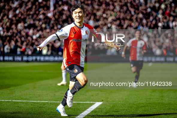 Feyenoord Rotterdam midfielder Inbeom Hwang scores the 2-0 and celebrates the goal during the match between Feyenoord and Twente at the Feye...