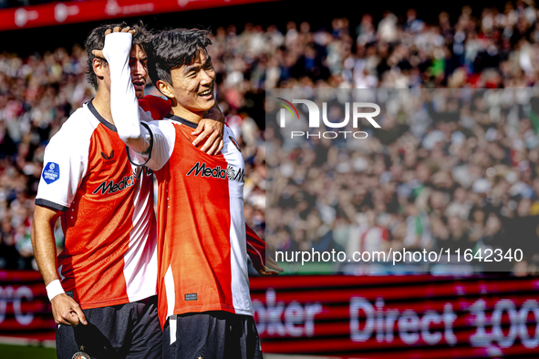 Feyenoord Rotterdam midfielder Inbeom Hwang scores the 2-0 and celebrates the goal during the match between Feyenoord and Twente at the Feye...