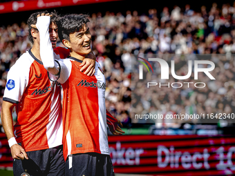 Feyenoord Rotterdam midfielder Inbeom Hwang scores the 2-0 and celebrates the goal during the match between Feyenoord and Twente at the Feye...