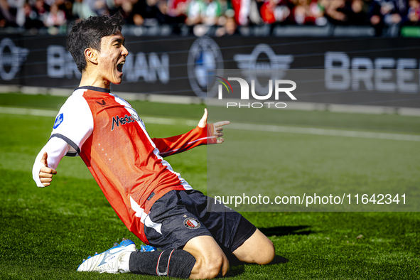 Feyenoord Rotterdam midfielder Inbeom Hwang scores the 2-0 and celebrates the goal during the match between Feyenoord and Twente at the Feye...