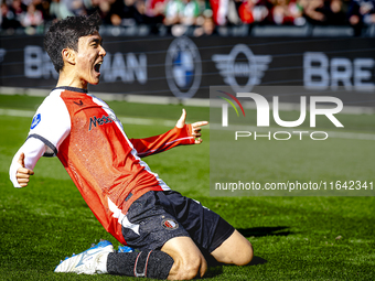 Feyenoord Rotterdam midfielder Inbeom Hwang scores the 2-0 and celebrates the goal during the match between Feyenoord and Twente at the Feye...