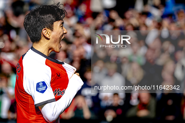 Feyenoord Rotterdam midfielder Inbeom Hwang scores the 2-0 and celebrates the goal during the match between Feyenoord and Twente at the Feye...