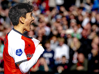 Feyenoord Rotterdam midfielder Inbeom Hwang scores the 2-0 and celebrates the goal during the match between Feyenoord and Twente at the Feye...