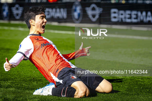 Feyenoord Rotterdam midfielder Inbeom Hwang scores the 2-0 and celebrates the goal during the match between Feyenoord and Twente at the Feye...