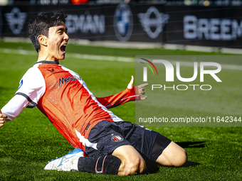 Feyenoord Rotterdam midfielder Inbeom Hwang scores the 2-0 and celebrates the goal during the match between Feyenoord and Twente at the Feye...