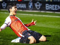 Feyenoord Rotterdam midfielder Inbeom Hwang scores the 2-0 and celebrates the goal during the match between Feyenoord and Twente at the Feye...