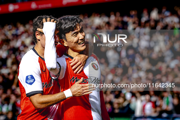 Feyenoord Rotterdam midfielder Inbeom Hwang scores the 2-0 and celebrates the goal during the match between Feyenoord and Twente at the Feye...