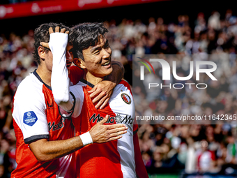 Feyenoord Rotterdam midfielder Inbeom Hwang scores the 2-0 and celebrates the goal during the match between Feyenoord and Twente at the Feye...