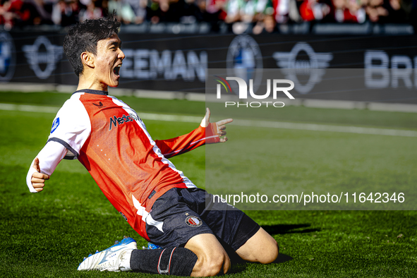 Feyenoord Rotterdam midfielder Inbeom Hwang scores the 2-0 and celebrates the goal during the match between Feyenoord and Twente at the Feye...