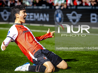 Feyenoord Rotterdam midfielder Inbeom Hwang scores the 2-0 and celebrates the goal during the match between Feyenoord and Twente at the Feye...