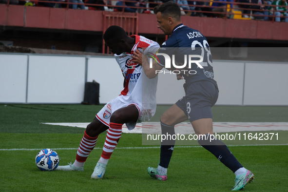 Davis Mensah of Mantova 1911 contrasts with Davide Adorni of Brescia Calcio FC during the Italian Serie B soccer championship match between...