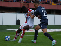 Davis Mensah of Mantova 1911 contrasts with Davide Adorni of Brescia Calcio FC during the Italian Serie B soccer championship match between...