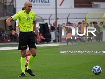 The referee of the match, Michael Fabbri of the Ravenna delegation, officiates during the Italian Serie B soccer championship football match...