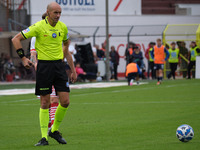 The referee of the match, Michael Fabbri of the Ravenna delegation, officiates during the Italian Serie B soccer championship football match...