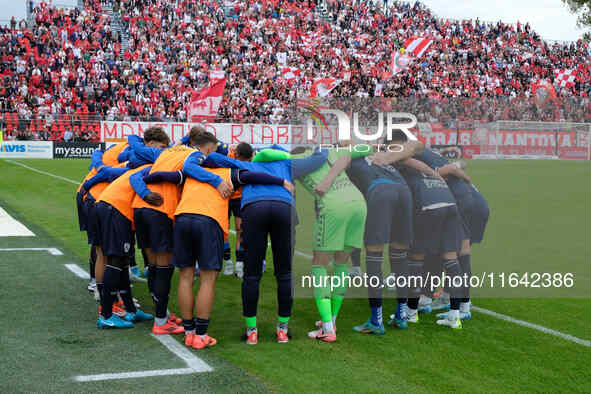 The Brescia Calcio FC team stands before the Italian Serie B soccer championship match between Mantova Calcio 1911 and Brescia Calcio FC at...