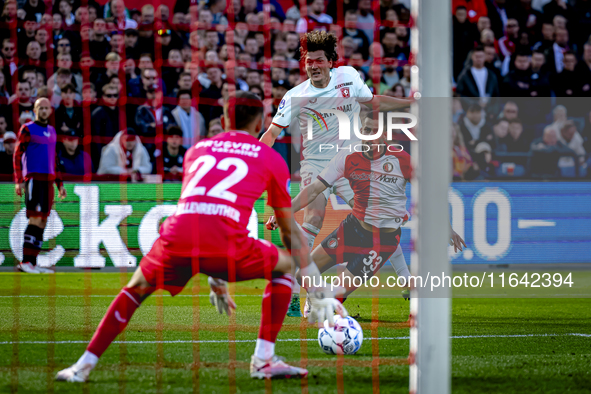 FC Twente forward Sam Lammers and Feyenoord Rotterdam defender David Hancko play during the match between Feyenoord and Twente at the Feyeno...