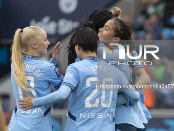 Mary Fowler #8 of Manchester City W.F.C. celebrates her goal with teammates during the Barclays FA Women's Super League match between Manche...