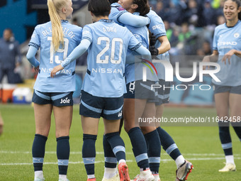 Mary Fowler #8 of Manchester City W.F.C. celebrates her goal with teammates during the Barclays FA Women's Super League match between Manche...