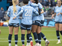 Mary Fowler #8 of Manchester City W.F.C. celebrates her goal with teammates during the Barclays FA Women's Super League match between Manche...