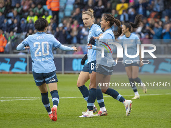 Mary Fowler #8 of Manchester City W.F.C. celebrates her goal with teammates during the Barclays FA Women's Super League match between Manche...