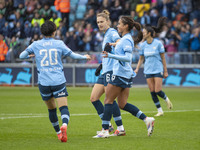 Mary Fowler #8 of Manchester City W.F.C. celebrates her goal with teammates during the Barclays FA Women's Super League match between Manche...