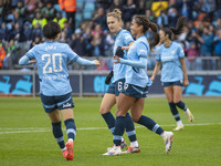 Mary Fowler #8 of Manchester City W.F.C. celebrates her goal with teammates during the Barclays FA Women's Super League match between Manche...