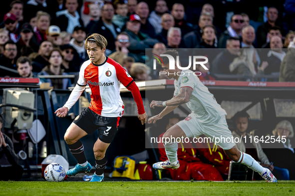 Feyenoord Rotterdam forward Ayase Ueda and FC Twente defender Mees Hilgers play during the match between Feyenoord and Twente at the Feyenoo...