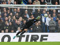 Robert Sanchez, Chelsea goalkeeper, makes a diving save during the Premier League match between Chelsea and Nottingham Forest at Stamford Br...