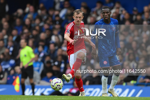 James Ward-Prowse of Nottingham Forest passes the ball during the Premier League match between Chelsea and Nottingham Forest at Stamford Bri...