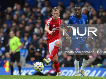 James Ward-Prowse of Nottingham Forest passes the ball during the Premier League match between Chelsea and Nottingham Forest at Stamford Bri...