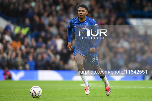 Wesley Fofana of Chelsea runs with the ball during the Premier League match between Chelsea and Nottingham Forest at Stamford Bridge in Lond...