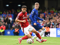 Alex Moreno of Nottingham Forest controls the ball under pressure from Cole Palmer of Chelsea during the Premier League match between Chelse...