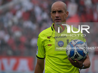 The referee of the match, Michael Fabbri of the Ravenna delegation, officiates during the Italian Serie B soccer championship football match...