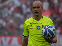 The referee of the match, Michael Fabbri of the Ravenna delegation, officiates during the Italian Serie B soccer championship football match...