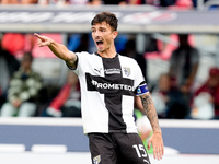 Enrico Delprato of Parma Calcio 1903 gestures during the Serie A Enilive match between Bologna FC and Parma Calcio 1903 at Stadio Renato Dal...