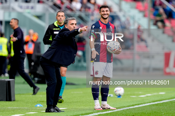 Riccardo Orsolini of Bologna FC argues with Fabio Pecchia head coach of Parma Calcio 1903 head coach of Bologna FC during the Serie A Eniliv...