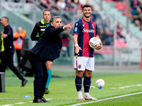 Riccardo Orsolini of Bologna FC argues with Fabio Pecchia head coach of Parma Calcio 1903 head coach of Bologna FC during the Serie A Eniliv...