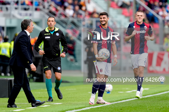 Riccardo Orsolini of Bologna FC argues with Fabio Pecchia head coach of Parma Calcio 1903 head coach of Bologna FC during the Serie A Eniliv...