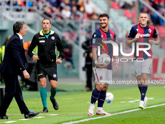 Riccardo Orsolini of Bologna FC argues with Fabio Pecchia head coach of Parma Calcio 1903 head coach of Bologna FC during the Serie A Eniliv...