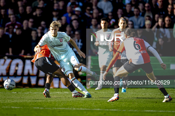 Feyenoord Rotterdam midfielder Quinten Timber and FC Twente defender Max Bruns play during the match between Feyenoord and Twente at the Fey...