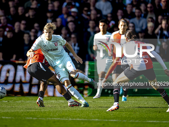 Feyenoord Rotterdam midfielder Quinten Timber and FC Twente defender Max Bruns play during the match between Feyenoord and Twente at the Fey...