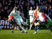 Feyenoord Rotterdam midfielder Quinten Timber and FC Twente defender Max Bruns play during the match between Feyenoord and Twente at the Fey...