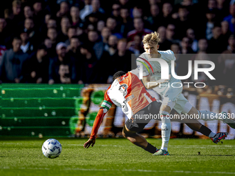 Feyenoord Rotterdam midfielder Quinten Timber and FC Twente defender Max Bruns play during the match between Feyenoord and Twente at the Fey...