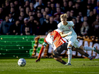 Feyenoord Rotterdam midfielder Quinten Timber and FC Twente defender Max Bruns play during the match between Feyenoord and Twente at the Fey...