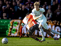 Feyenoord Rotterdam midfielder Quinten Timber and FC Twente defender Max Bruns play during the match between Feyenoord and Twente at the Fey...