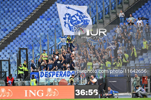 Supporters of Empoli F.C. attend the 7th day of the Serie A Championship between S.S. Lazio and Empoli F.C. at the Olympic Stadium in Rome,...