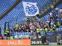 Supporters of Empoli F.C. attend the 7th day of the Serie A Championship between S.S. Lazio and Empoli F.C. at the Olympic Stadium in Rome,...