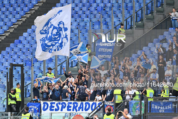 Supporters of Empoli F.C. attend the 7th day of the Serie A Championship between S.S. Lazio and Empoli F.C. at the Olympic Stadium in Rome,...